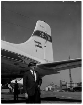 October 1959. SAA. Singer departing by SAA Douglas DC-7B ZS-DKE 'Reiger'.