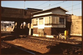 Signalling building between railway lines.