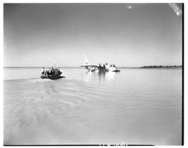Vaal Dam, circa 1948. Arrival of BOAC Solent flying boat G-AHIN 'Southampton'. Passenger boat on ...