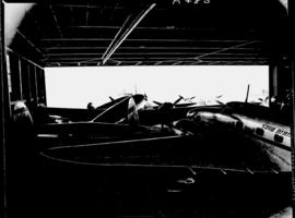 Johannesburg, circa 1941. SAA Lockheed planes  at Rand Airport inside hangar.