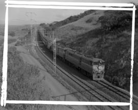 Durban district, 1964. SAR Class 5E1's Srs 2 with 'Trans Natal' passenger train near Shellcross.