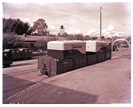 "Johannesburg, 1950. Mobile containers on railway wagon at Langlaagte."