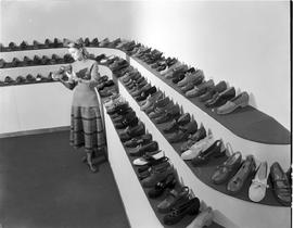 George, 1949. Shoe factory sample room.