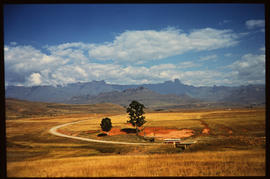 Drakensberg, 1984. SAR tour bus with Amphitheatre in the distance.