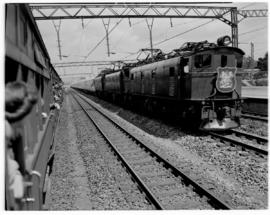 
Three SAR Class 1E's working the Royal Train - empty stock - between Pretoria and Germiston.
