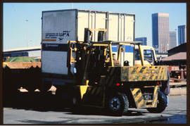 Johannesburg, 1989. Forklift handling container at Kaserne.